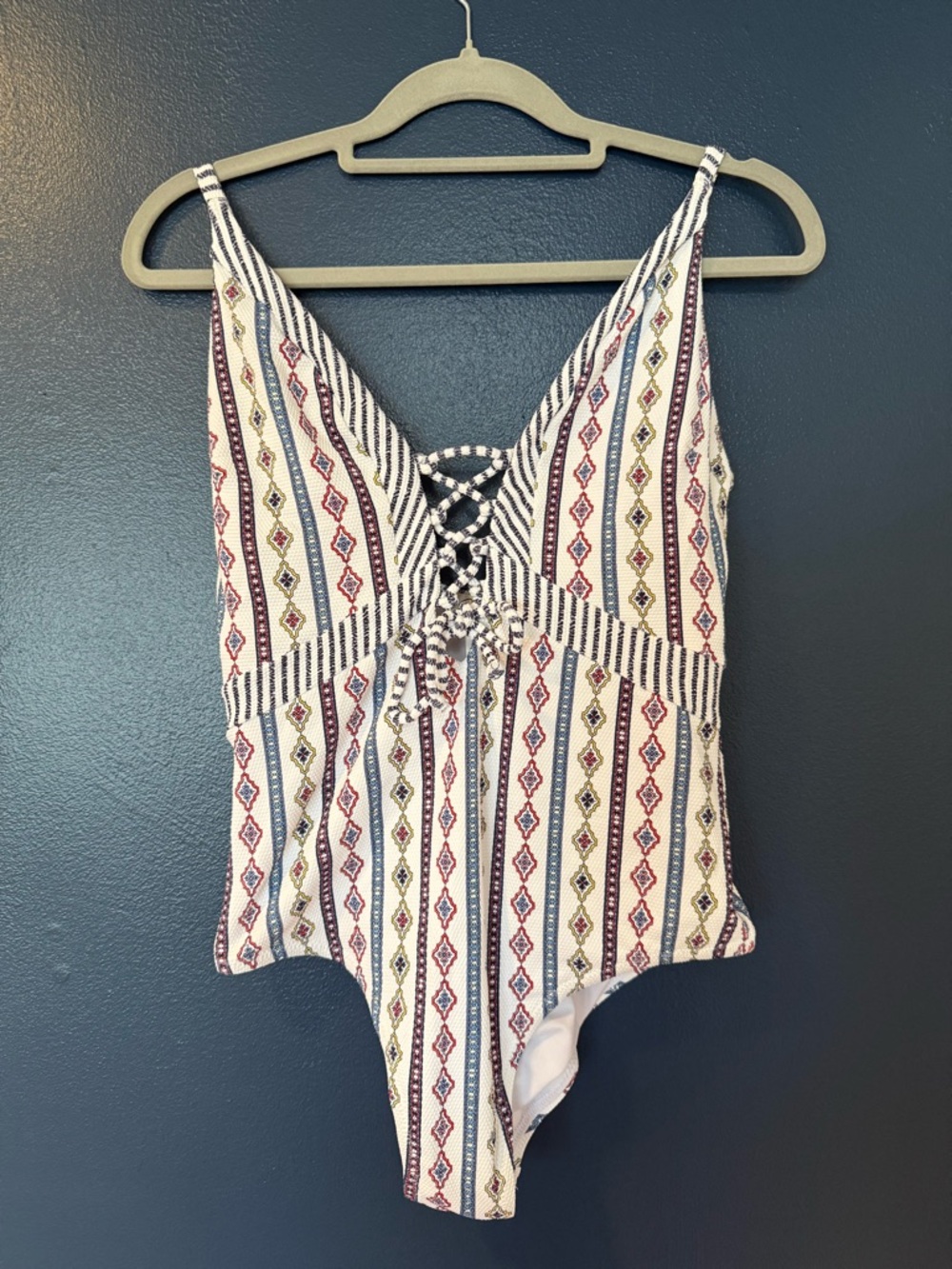 Jessica Simpson Striped Lace-Up One-Piece Swimsuit in White, Navy, Red, Yellow